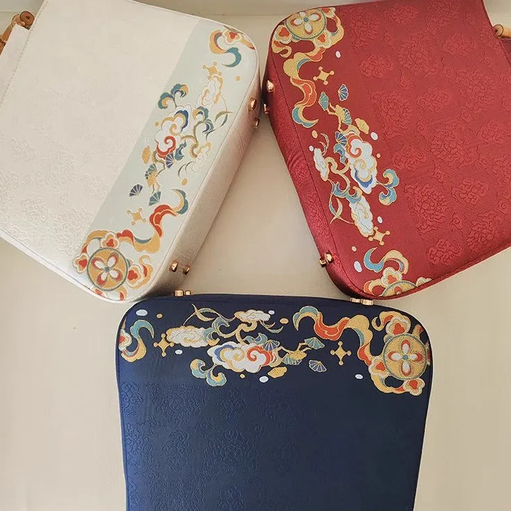 Shizi Xiqiu 狮子戏球 Playful Lions Bamboo Handle Brocade Bag