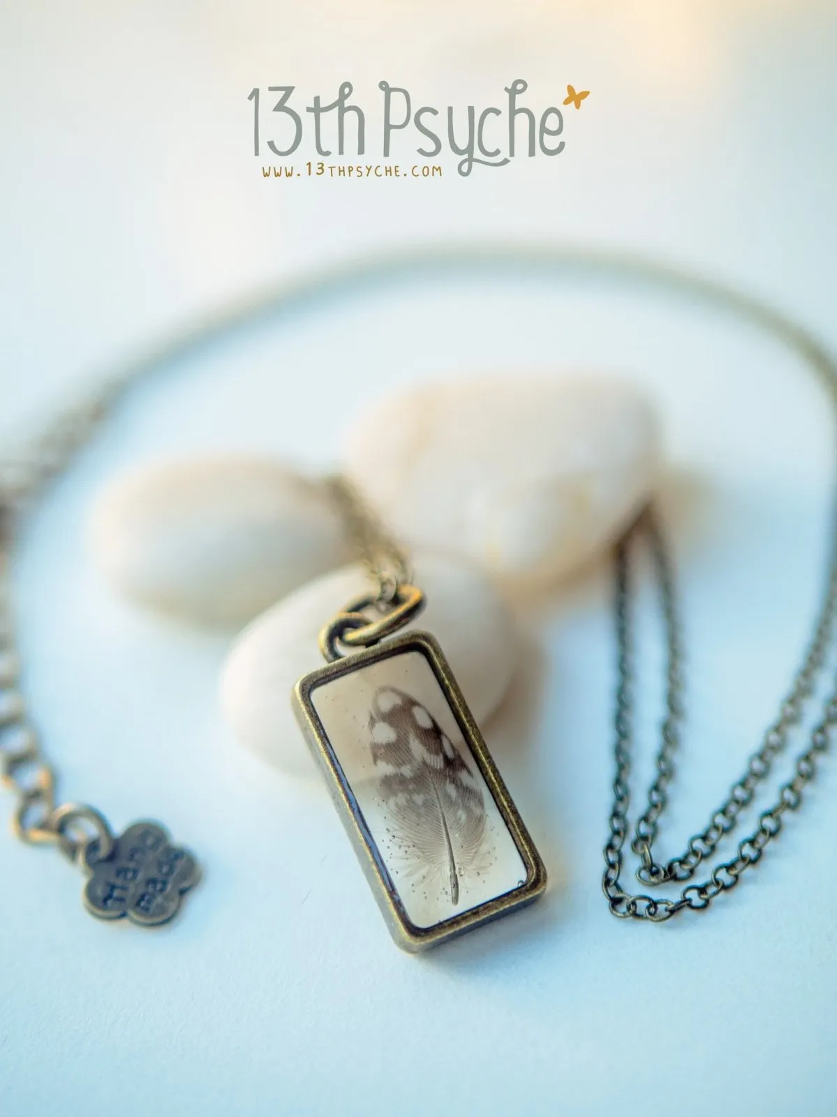 Square shaped resin pendant with real tiny feather necklace