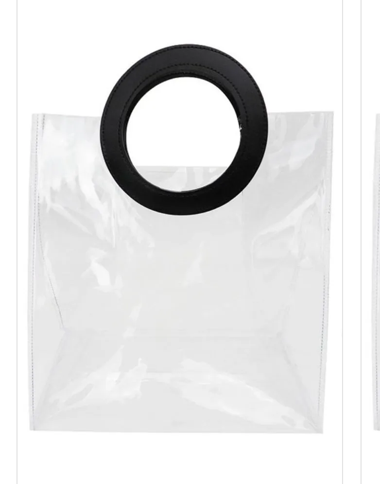 WOMEN CLEAR TRANSULANT RING HANDLE TOTE BAG.