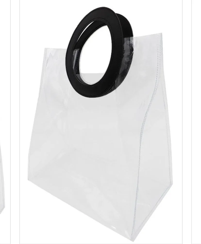 WOMEN CLEAR TRANSULANT RING HANDLE TOTE BAG.