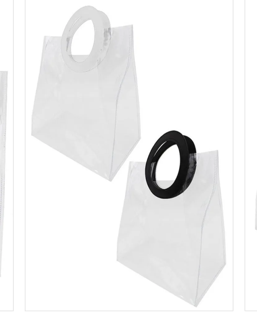 WOMEN CLEAR TRANSULANT RING HANDLE TOTE BAG.